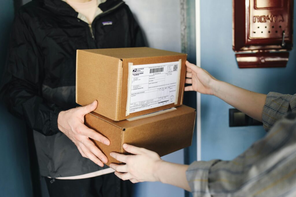 human handing over packages